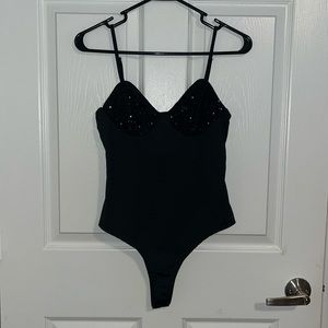 Black sequin body suit